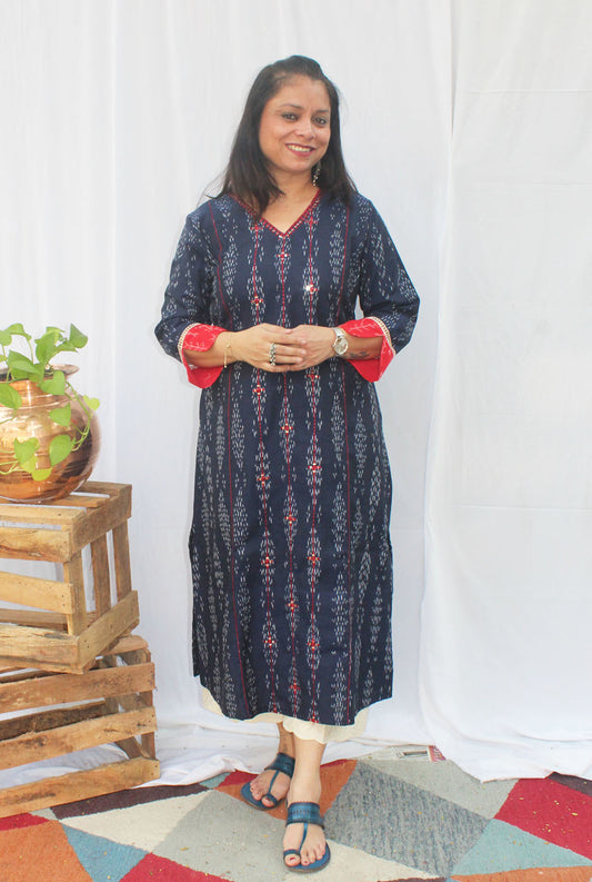 A line kurti with machine embroidery detailing